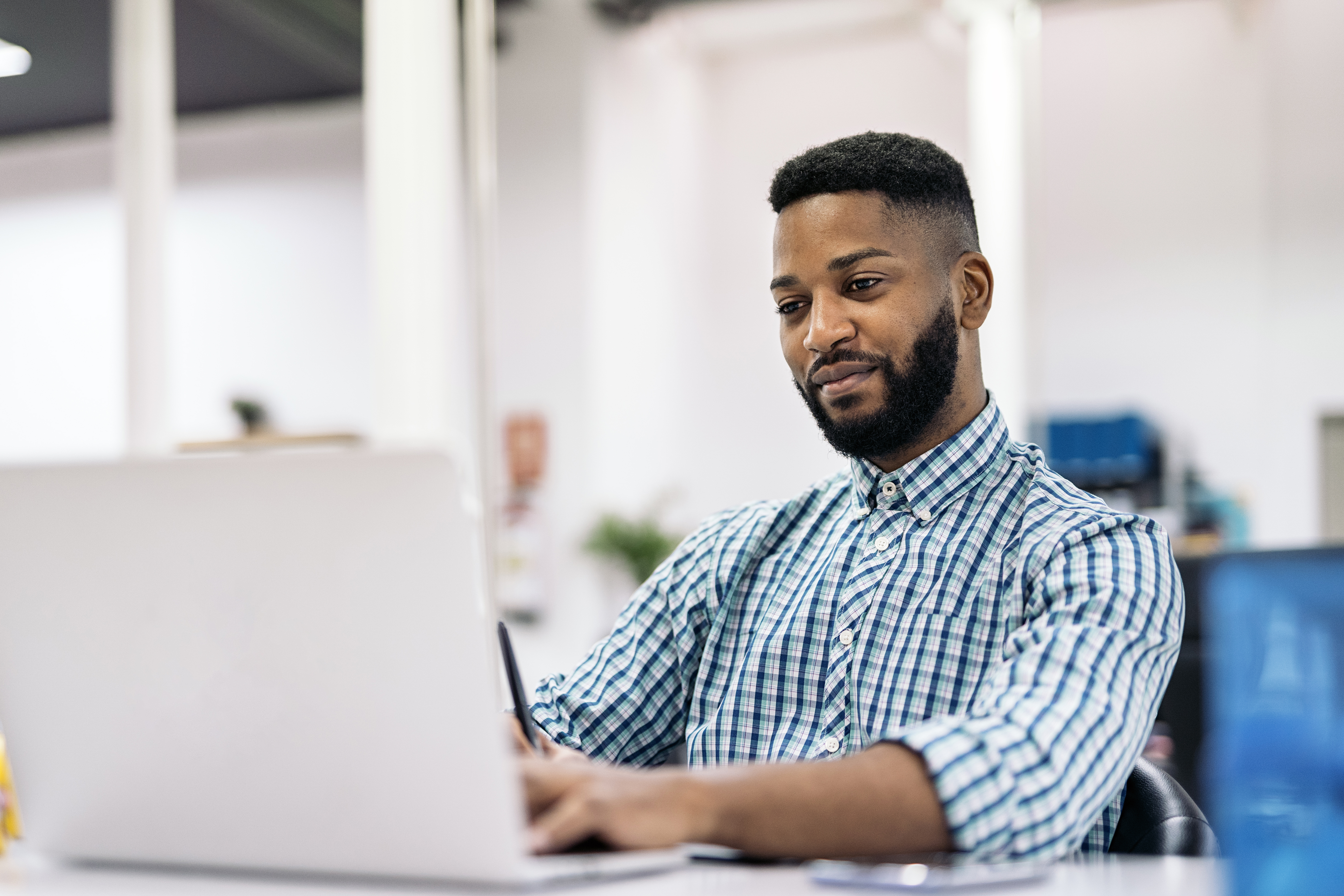 African Man Working in Office